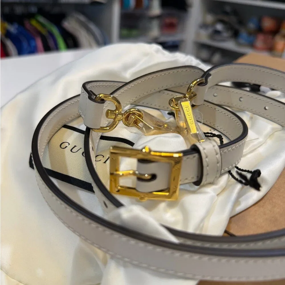 Gucci White leather straps with gold accent - NEW